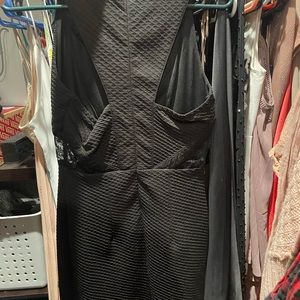 Black dress with lace keyhole short in length worn once purchased at Dillards